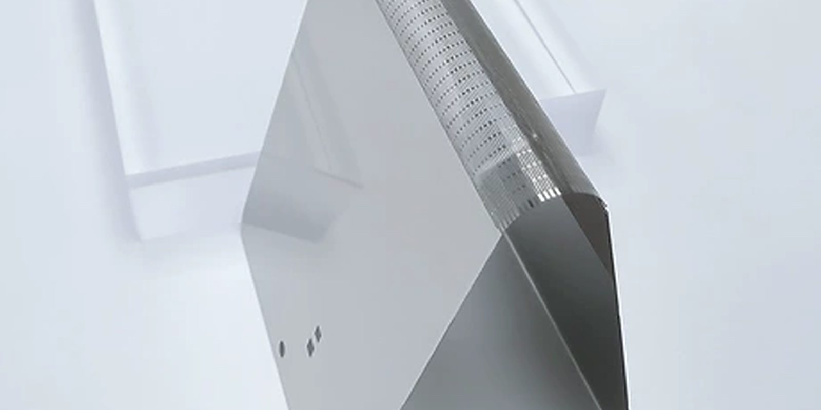 Side view of a thin folded metal support plate showing the precision patterned bending zone