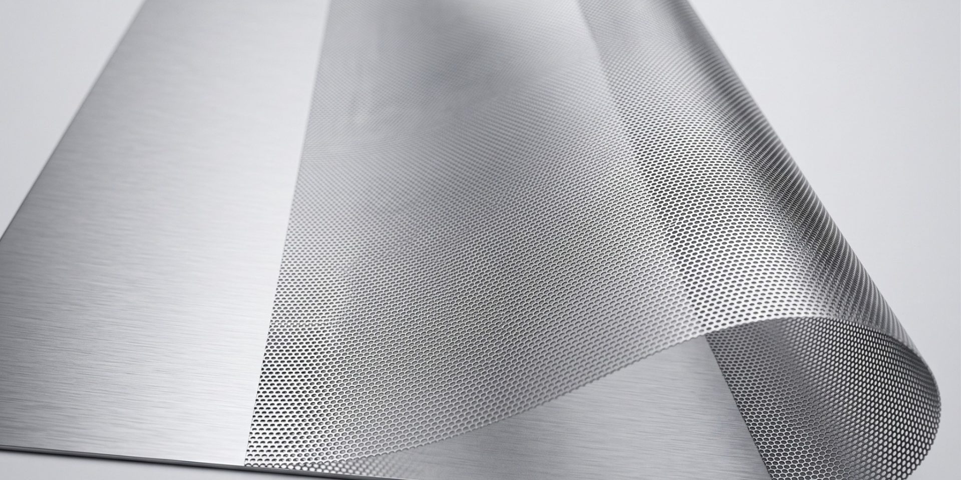 Flexible photo-etched metal mesh with dense perforations for foldable-phone support structures
