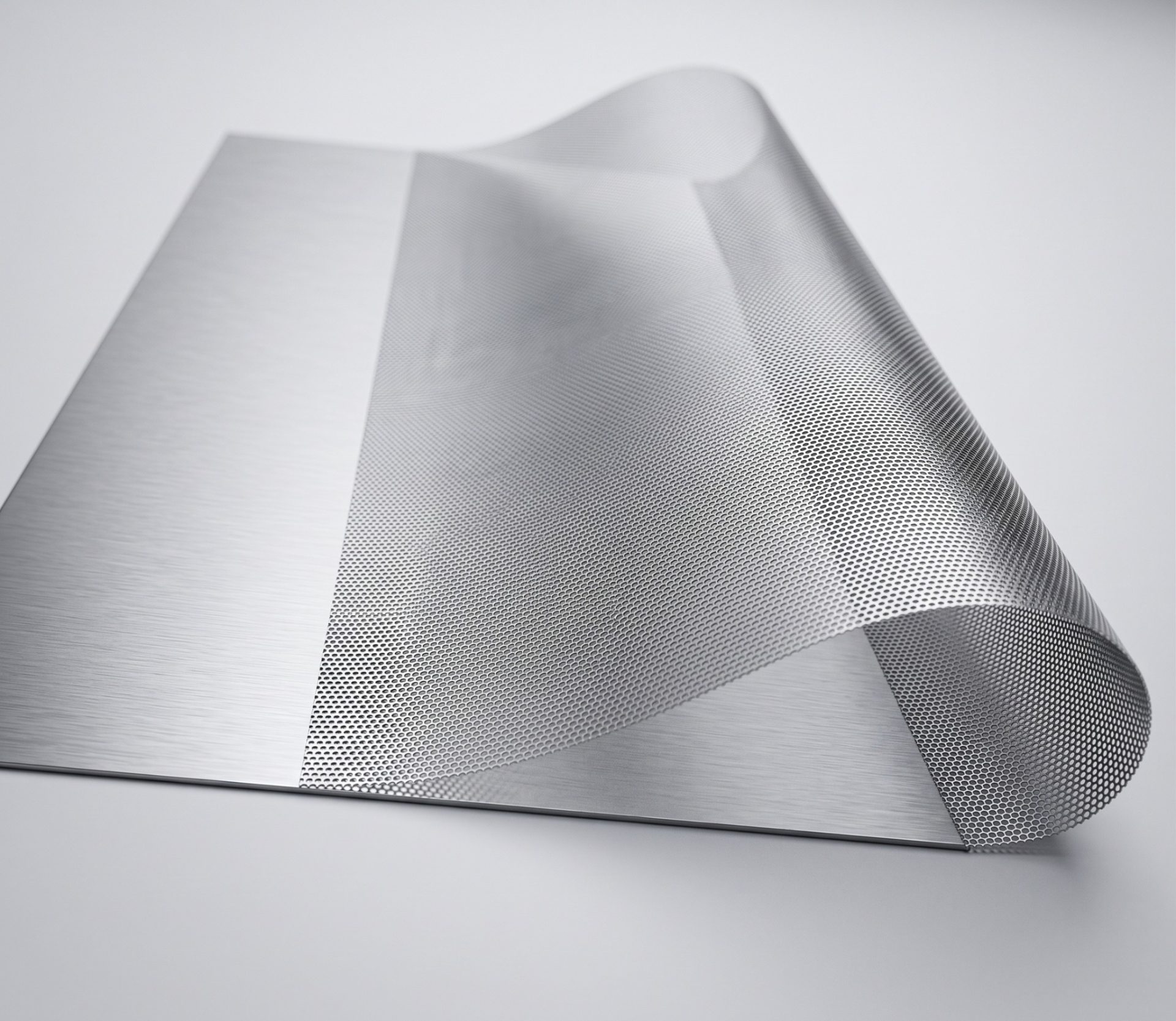 Flexible photo-etched metal mesh with dense perforations for foldable-phone support structures