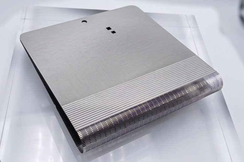 Thin titanium support plate with dense etched folding-zone pattern for foldable electronics DFM