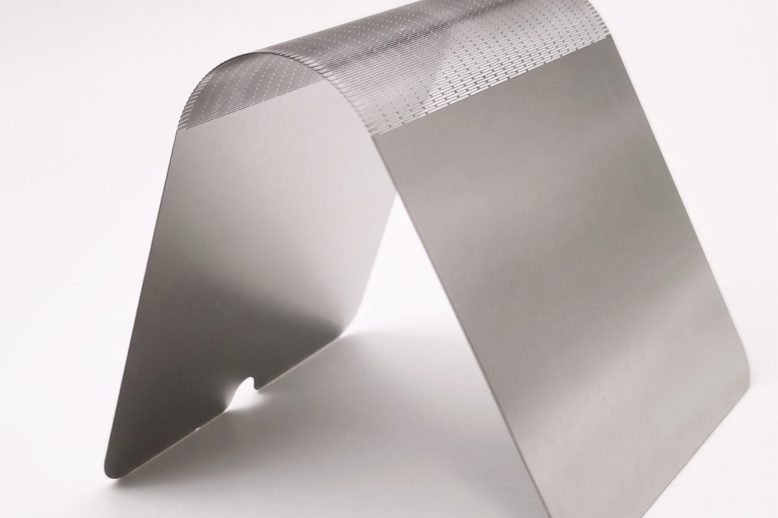 Micro-patterned thin metal folding zone for a foldable-display titanium support plate