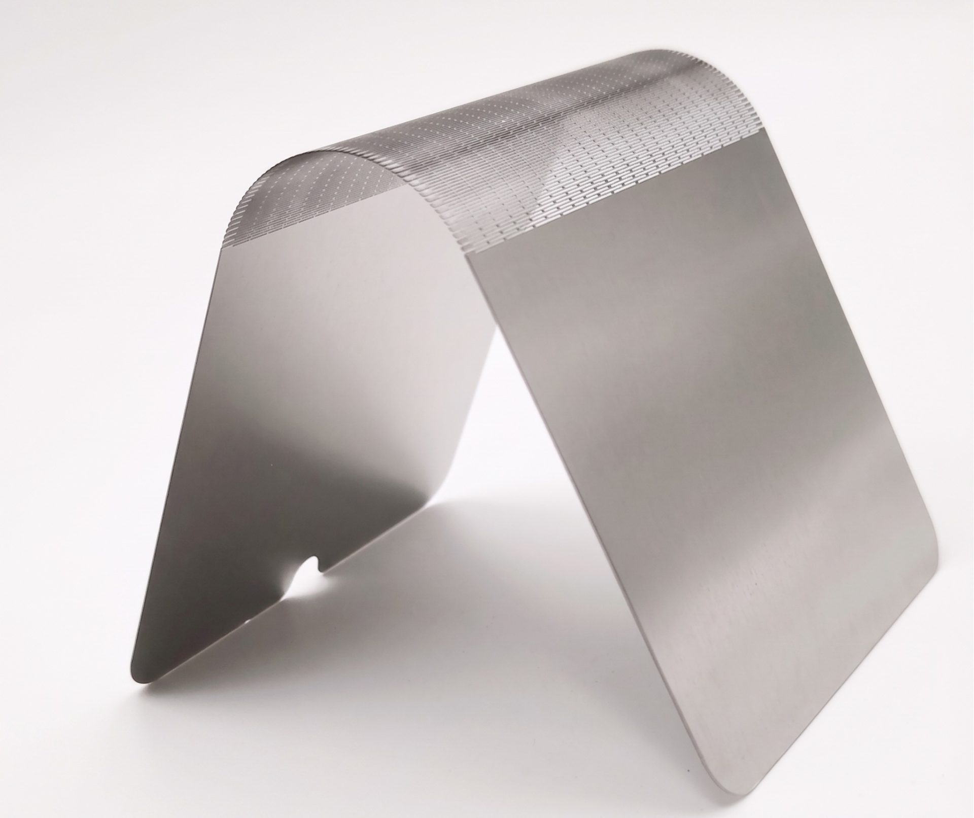 Micro-patterned thin metal folding zone for a foldable-display titanium support plate